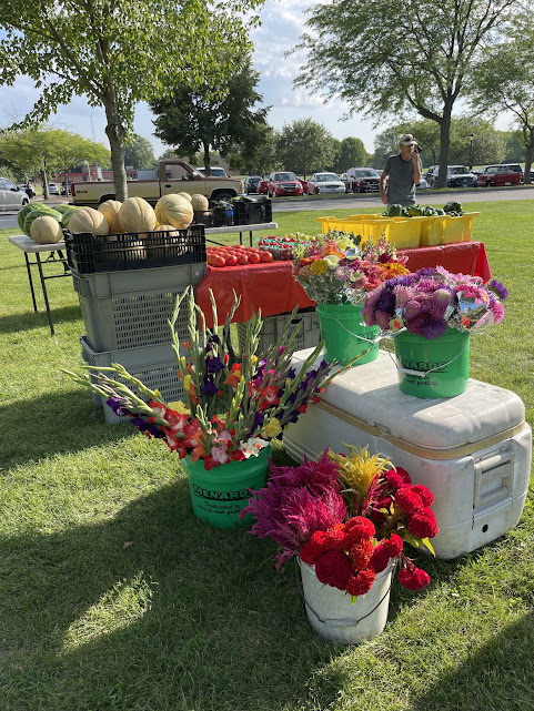 Picture of fruits, vegetables, and flower vendor